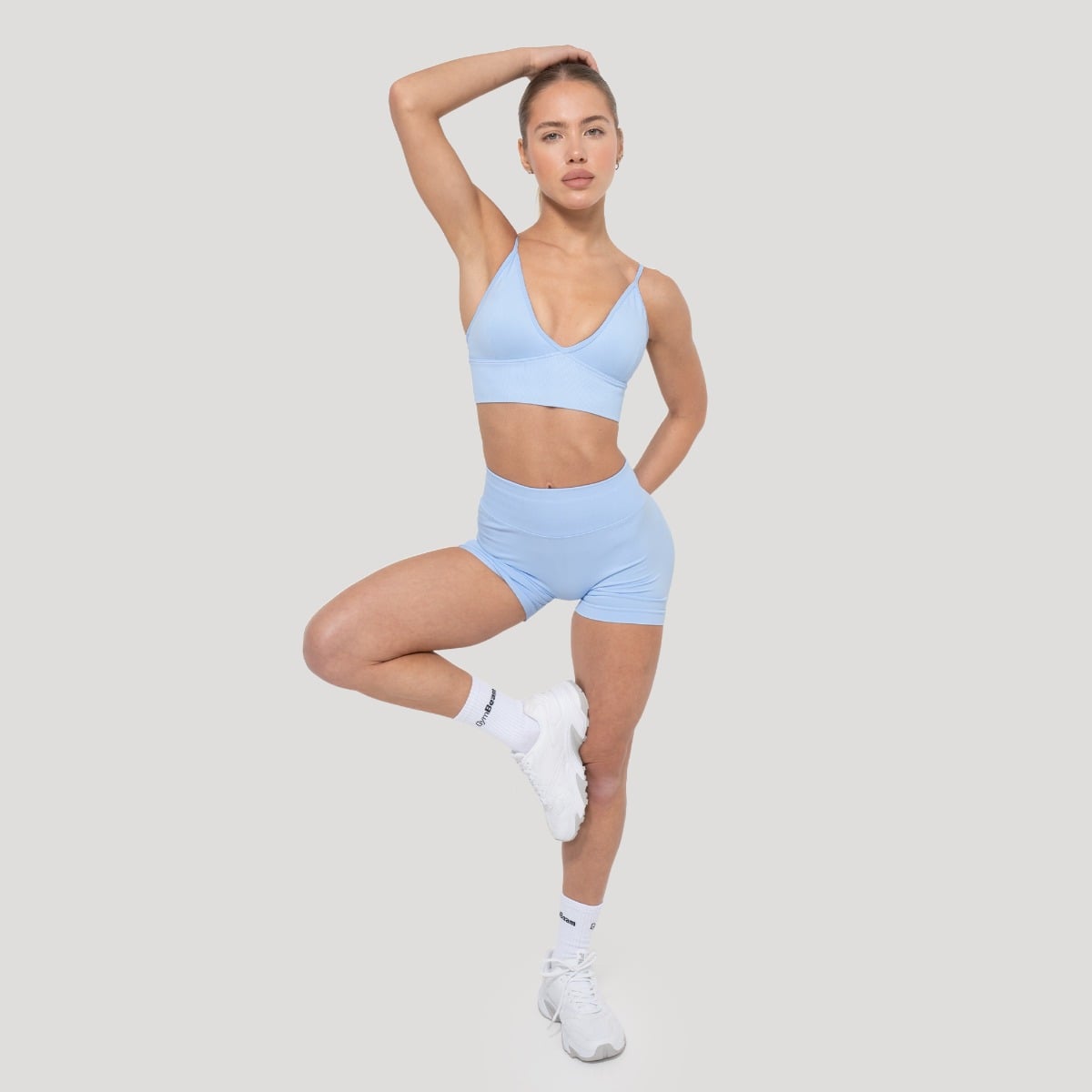 GymBeam Luma Sports Bra Baby Blue - Rozmiar: XL | Kolor: Niebieski | Waga: 0,126 g | Opakowanie: 108 · záber 8
