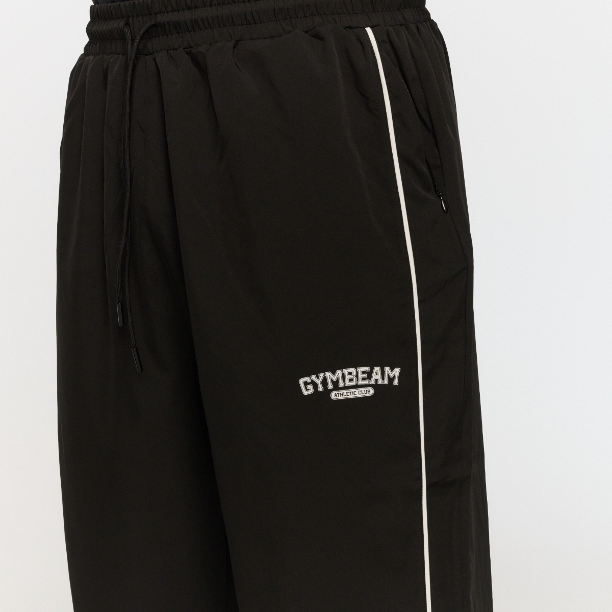 GymBeam Varsity Pants Black - Kolor: Czarny | Waga: 0,29 g | Opakowanie: 60 · záber 6