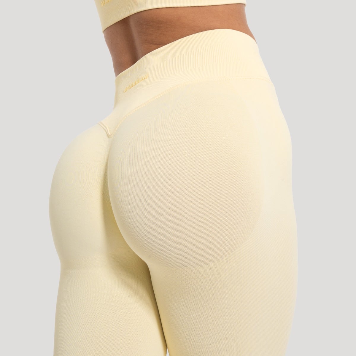 Damskie legginsy Luma Butter Yellow - GymBeam