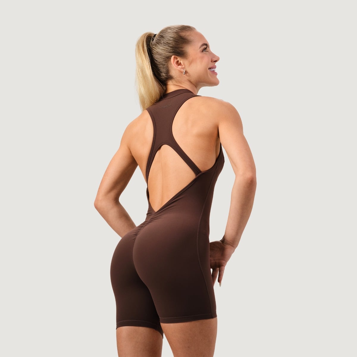 Damski kombinezon Zip-Up NEO Mocha - GymBeam