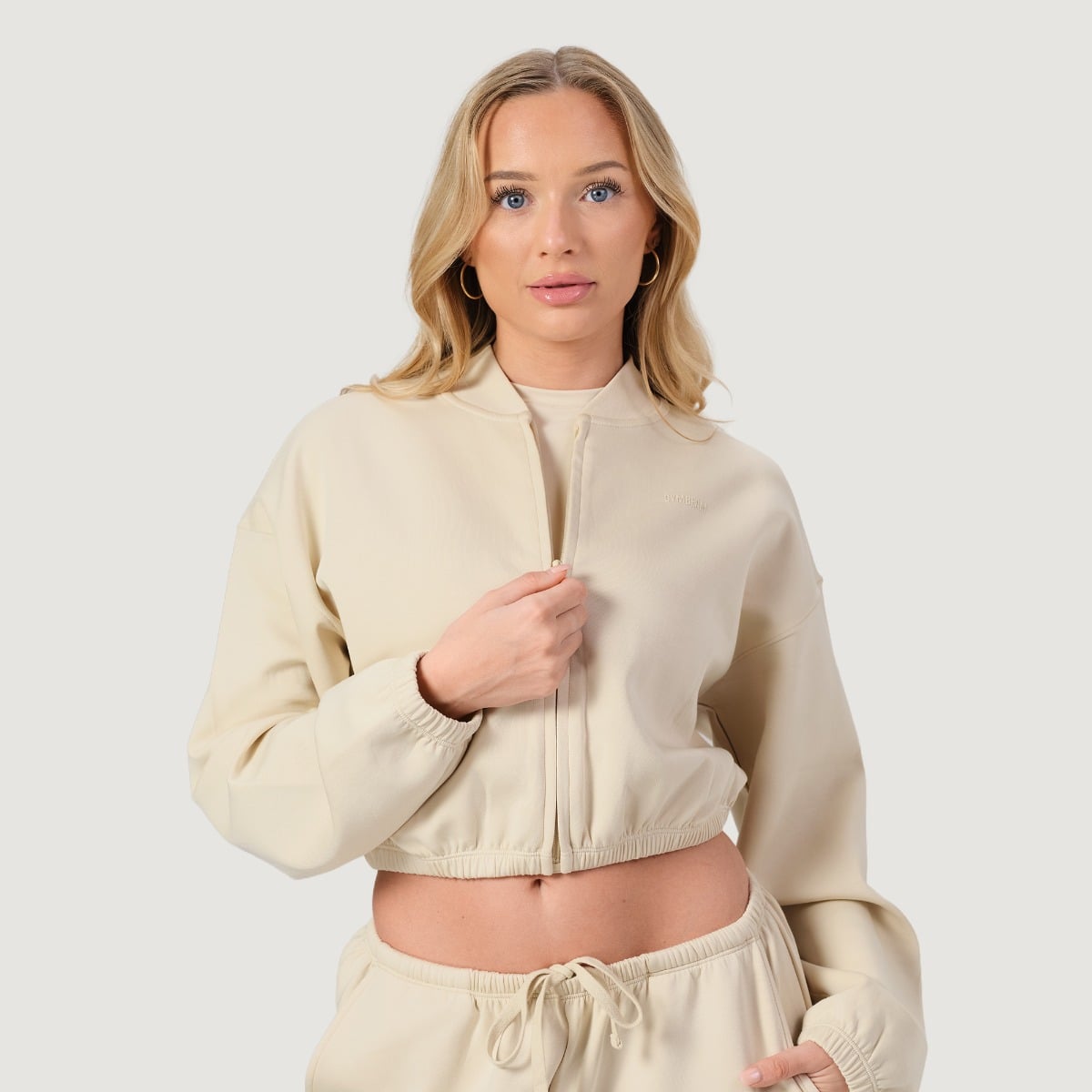 Damska bluza Zip-Up NEO Almond - GymBeam