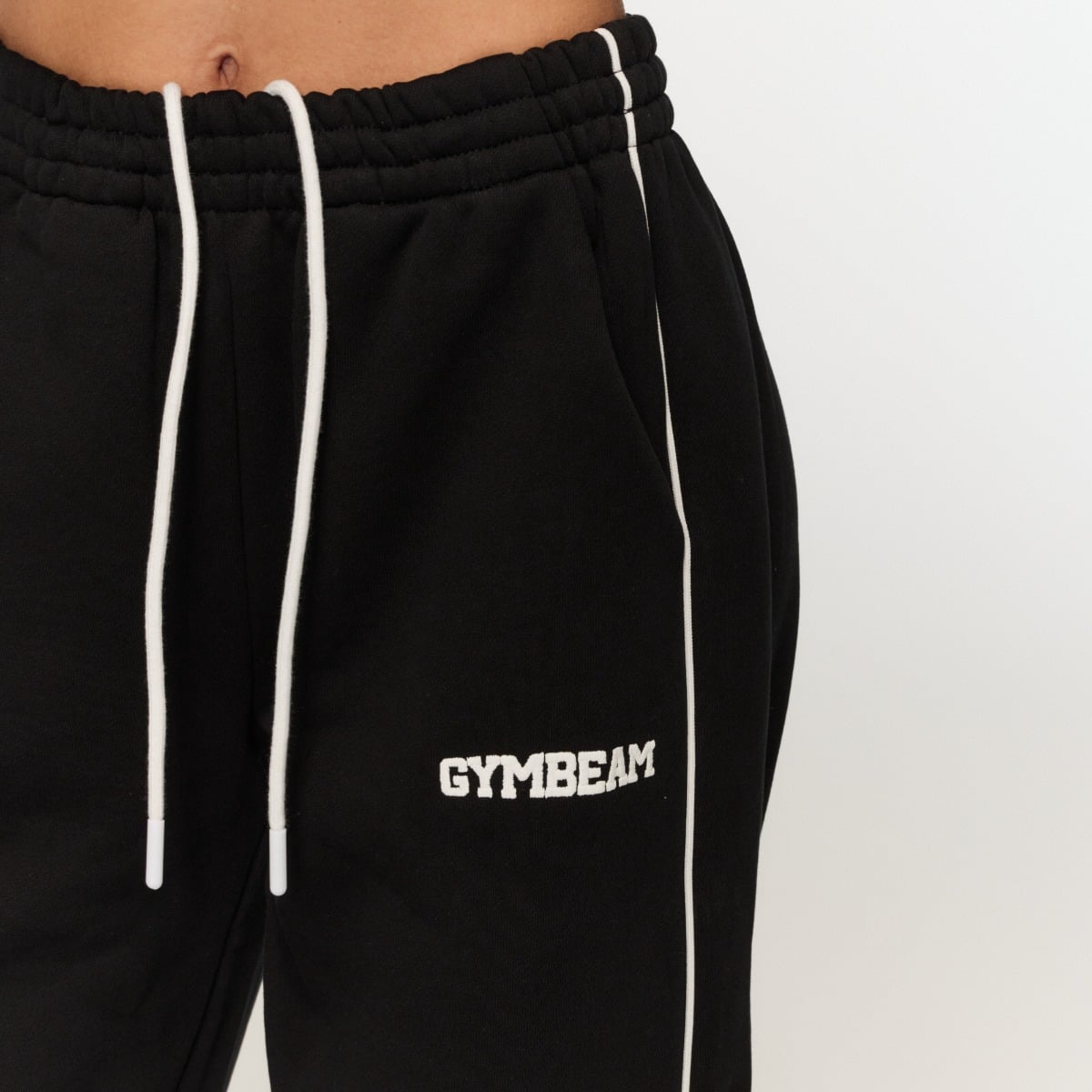 Damskie spodnie dresowe Varsity Black - GymBeam